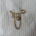 Broche bianca