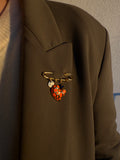 Broche doré